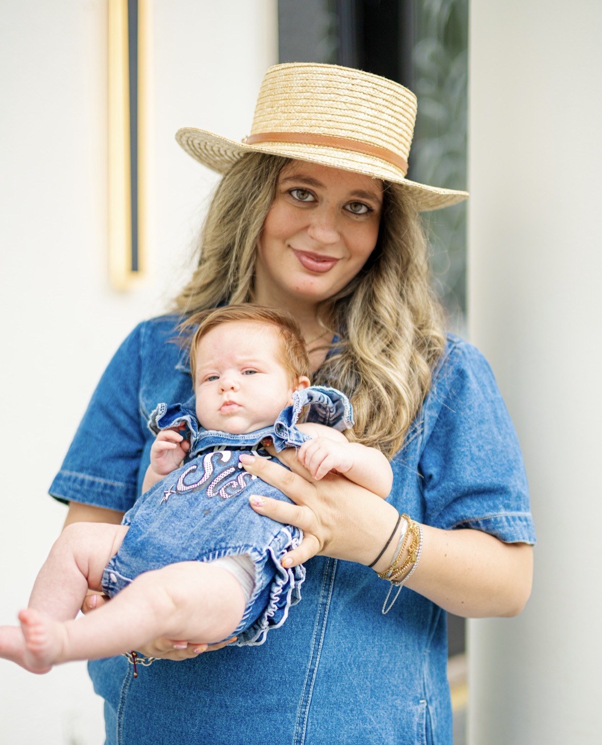 Samantha holding her baby